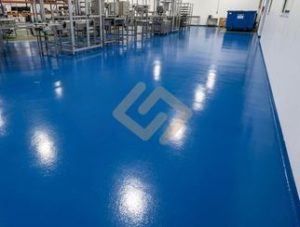 High gloss blue epoxy flooring installed by Chemflex Chemicals for a pharmaceutical packaging facility in Horana, Sri Lanka.